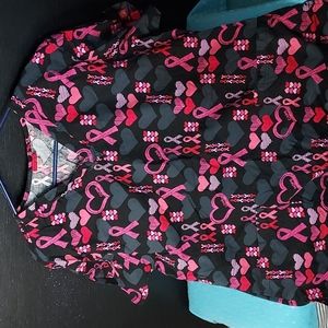Buy all 6 scrubs and i will make them 5 each!  Dickies breast cancer scrub top